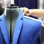 Measuring the shoulder length on a jacket