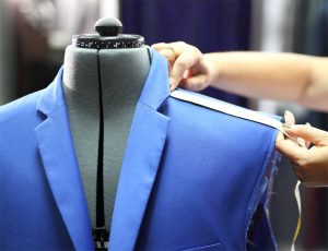 Measuring the shoulder length on a jacket
