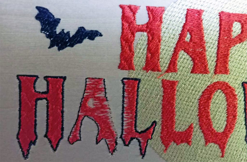 Halloween embroidery on wood