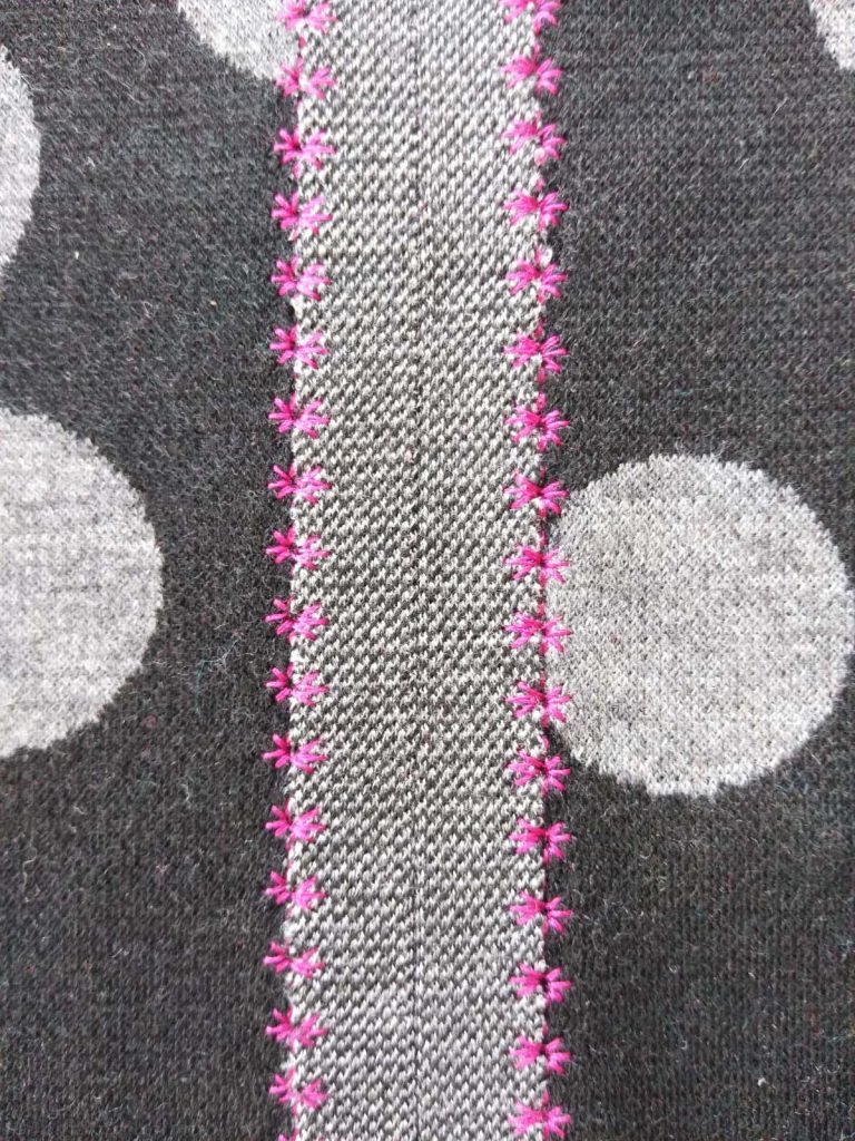 Seam with scallop stitching