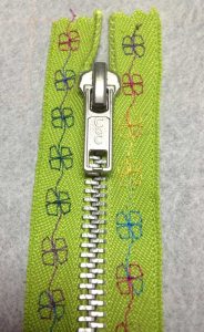 Green zipper with flowers